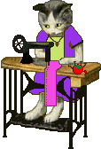 cat using sewing machine